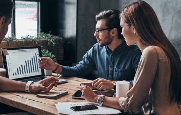 A team of marketers working on a presentation.