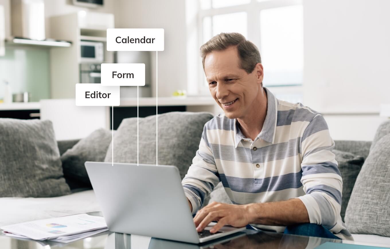 A man working on his laptop.